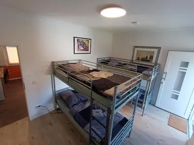 Ein Bett oder Betten in einem Zimmer der Unterkunft GranseeHOSTEL