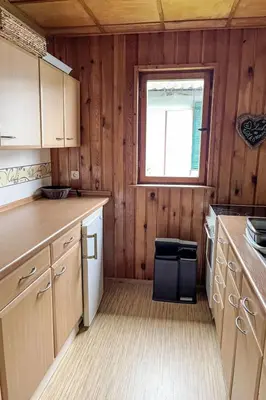 Küche/Küchenzeile in der Unterkunft Chalet Bootshaus auf dem See by Interhome