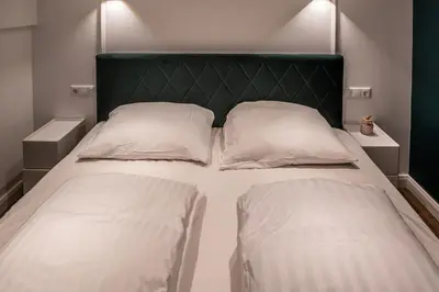Ein Bett oder Betten in einem Zimmer der Unterkunft Oran Apartment 3