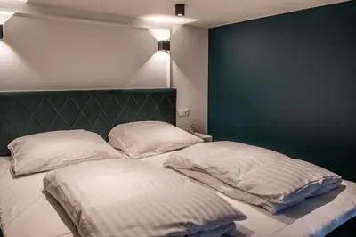 Ein Bett oder Betten in einem Zimmer der Unterkunft Oran Apartment 3