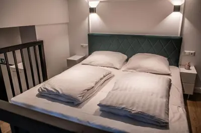 Ein Bett oder Betten in einem Zimmer der Unterkunft Oran Apartment 3