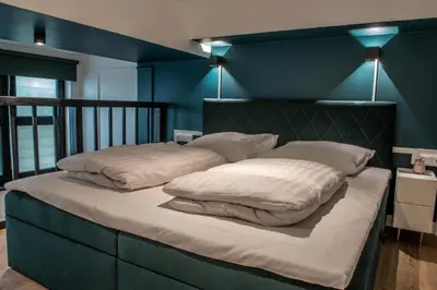 Ein Bett oder Betten in einem Zimmer der Unterkunft Oran Apartment 4