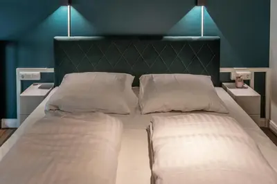 Ein Bett oder Betten in einem Zimmer der Unterkunft Oran Apartment 4