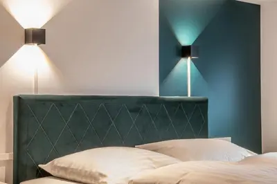 Ein Bett oder Betten in einem Zimmer der Unterkunft Oran Apartment 5