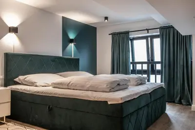 Ein Bett oder Betten in einem Zimmer der Unterkunft Oran Apartment 5