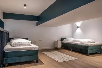 Ein Bett oder Betten in einem Zimmer der Unterkunft Oran Apartment 6