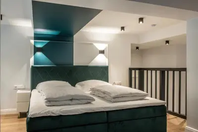 Ein Bett oder Betten in einem Zimmer der Unterkunft Oran Apartment 7