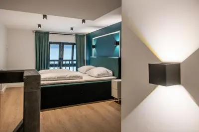 Ein Bett oder Betten in einem Zimmer der Unterkunft Oran Apartment 8