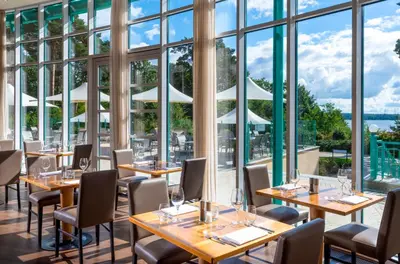 Ein Restaurant oder anderes Speiselokal in der Unterkunft Precise Resort Scharmützelsee - Golf & SPA