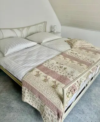 Ein Bett oder Betten in einem Zimmer der Unterkunft BERlin Apartment - Naturnah & Startklar