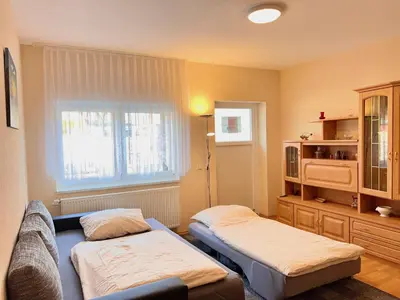 Ein Bett oder Betten in einem Zimmer der Unterkunft Turmhof Jüterbog