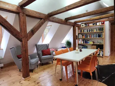 Ein Sitzbereich in der Unterkunft Ferienwohnungen Hermannsmuehle