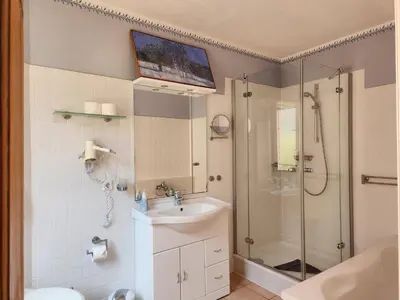 Ein Badezimmer in der Unterkunft Ferienwohnungen Hermannsmuehle