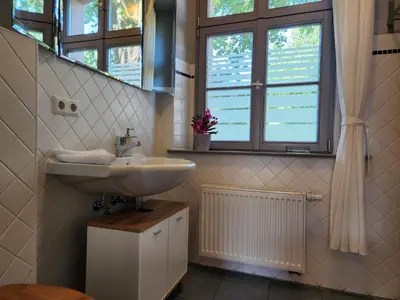 Ein Badezimmer in der Unterkunft Grafschaft