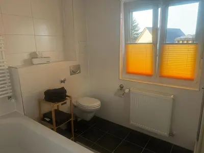 Ein Badezimmer in der Unterkunft Kaminzimmer