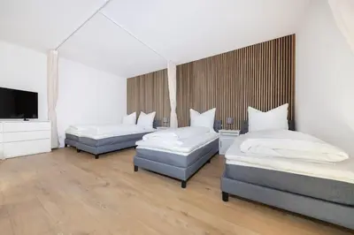 Ein Bett oder Betten in einem Zimmer der Unterkunft Zentrales Gallerie-Loft Alexanderplatz
