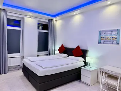 Ein Bett oder Betten in einem Zimmer der Unterkunft Brandneues Apartment mit 3 Schlafzimmern