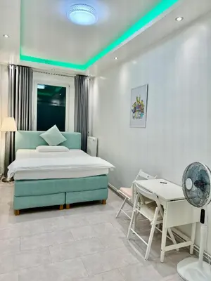 Ein Bett oder Betten in einem Zimmer der Unterkunft Brandneues Apartment mit 3 Schlafzimmern