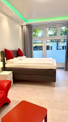Ein Bett oder Betten in einem Zimmer der Unterkunft Brandneues Apartment mit 3 Schlafzimmern