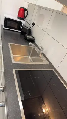 Küche/Küchenzeile in der Unterkunft Brandneues Apartment mit 3 Schlafzimmern