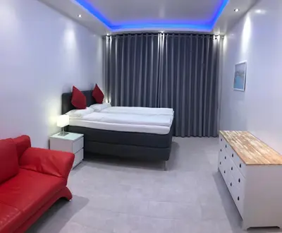 Ein Bett oder Betten in einem Zimmer der Unterkunft Brandneues Apartment mit 3 Schlafzimmern