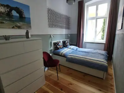 Ein Bett oder Betten in einem Zimmer der Unterkunft Ferienwohnung Potsdam