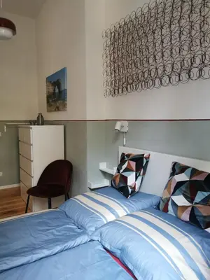Ein Bett oder Betten in einem Zimmer der Unterkunft Ferienwohnung Potsdam
