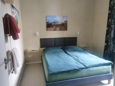 Ein Bett oder Betten in einem Zimmer der Unterkunft Ferienwohnung Potsdam