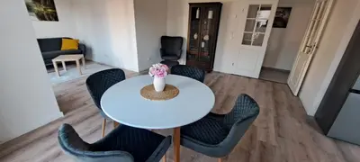 Ein Sitzbereich in der Unterkunft Apartment Villa Brieselang