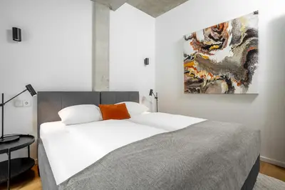 Ein Bett oder Betten in einem Zimmer der Unterkunft Global Living I TheGraf - East Side Gallery