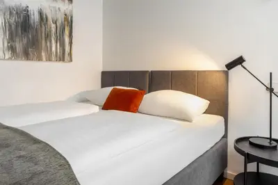 Ein Bett oder Betten in einem Zimmer der Unterkunft Global Living I TheGraf - East Side Gallery