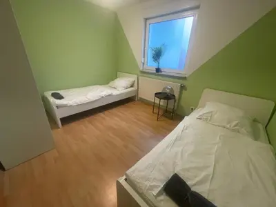 Ein Bett oder Betten in einem Zimmer der Unterkunft 3-Zimmer-Monteurswohnung in Werder für 6 Personen