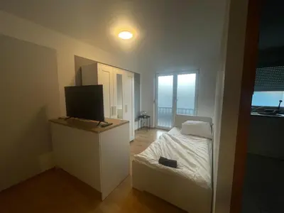 Ein Bett oder Betten in einem Zimmer der Unterkunft 3-Zimmer-Monteurswohnung in Werder für 6 Personen