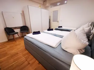 Ein Bett oder Betten in einem Zimmer der Unterkunft INVAL by ROCKCHAIR Apartments l SUPERHOST Status l 2 Bedrooms Boxspringbeds 2 Bathrooms in City Center 