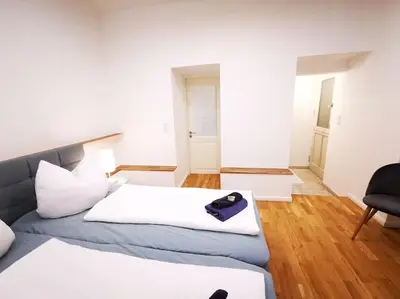 Ein Bett oder Betten in einem Zimmer der Unterkunft INVAL by ROCKCHAIR Apartments l SUPERHOST Status l 2 Bedrooms Boxspringbeds 2 Bathrooms in City Center 