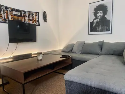 Ein Sitzbereich in der Unterkunft Cozy and Peaceful Apartment, Top Located