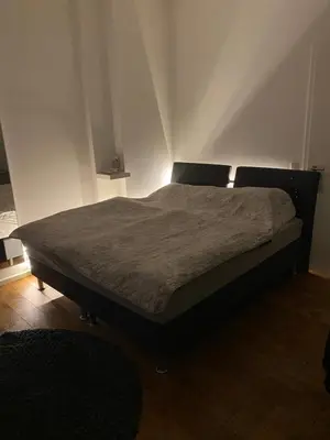 Ein Bett oder Betten in einem Zimmer der Unterkunft Cozy and Peaceful Apartment, Top Located