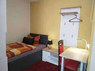 Ein Bett oder Betten in einem Zimmer der Unterkunft Ferienwohnung Baer 2