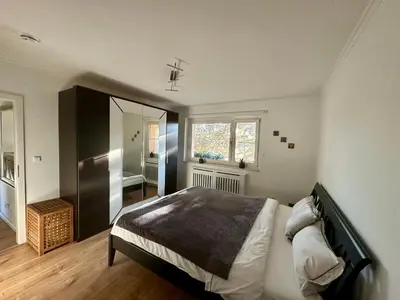 Ein Bett oder Betten in einem Zimmer der Unterkunft Ruhiges Apartment in Berlin mit Parkplatz & Balkon