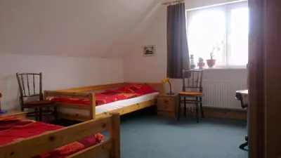 Ein Bett oder Betten in einem Zimmer der Unterkunft Gästewohnung Wansdorf