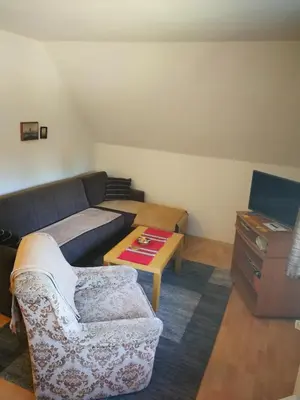Ein Sitzbereich in der Unterkunft Gästewohnung Wansdorf