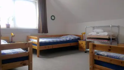 Ein Bett oder Betten in einem Zimmer der Unterkunft Gästewohnung Wansdorf
