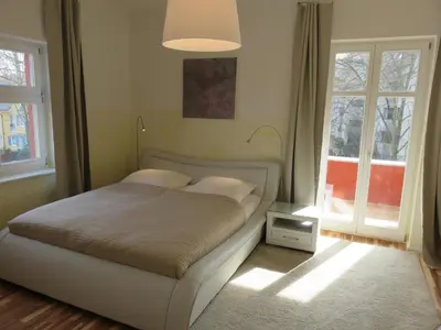 Ein Bett oder Betten in einem Zimmer der Unterkunft Apartement in Stadtvilla