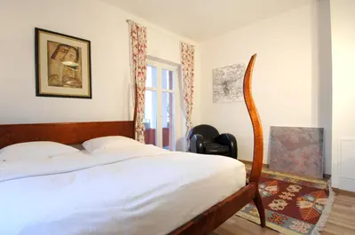Ein Bett oder Betten in einem Zimmer der Unterkunft Apartement in Stadtvilla