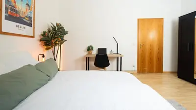 Ein Bett oder Betten in einem Zimmer der Unterkunft Helle & gemütliche Dachwohnung mit Terasse