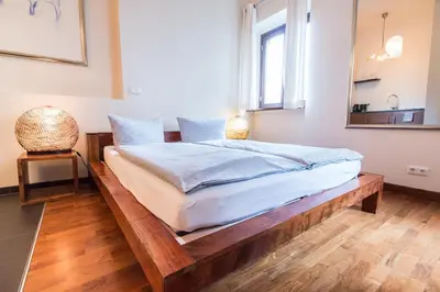 Ein Bett oder Betten in einem Zimmer der Unterkunft Visage Appart
