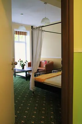 Ein Bett oder Betten in einem Zimmer der Unterkunft Gutshof Sagritz