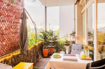 Ein Balkon oder eine Terrasse in der Unterkunft quit and central designer loft with elevator