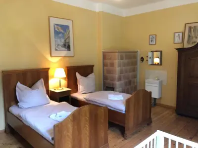 Ein Bett oder Betten in einem Zimmer der Unterkunft Schönewalde Appartement 1