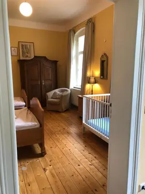 Ein Bett oder Betten in einem Zimmer der Unterkunft Schönewalde Appartement 1